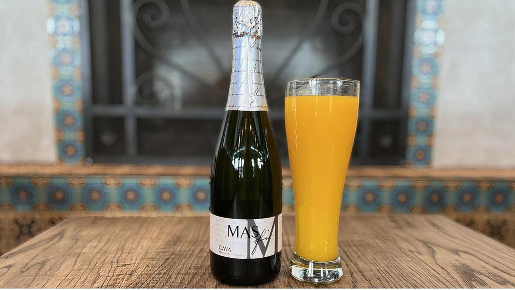 Mimosa Package · bottle of Mas Fi Cava Brut and fresh squeezed orange juice