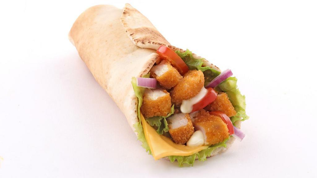 Regular Milanesa / Breaded Steak Burrito · Hot & Tasty Burrito prepared with Breaded Steak, beans, rice, cheese, lettuce, salsa, sour cream, avocados, and jalapeño. Served in customer's preference of Tortilla.