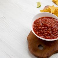 Chips & Salsa (4 Oz) · Just out of the fryer corn chips made with fresh, daily made corn tortillas. Served with one...