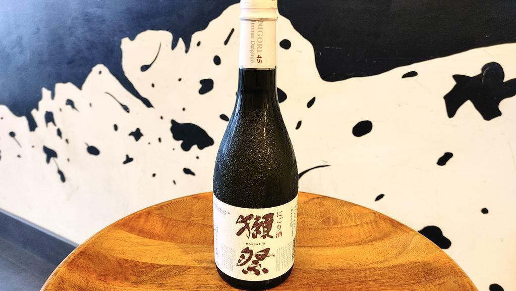 Dassai 45 Nigori ( 720 ml ) · Alcohol 14%  720ml
Dassai Nigori 45 
Japanese Sake- Junmai - Daiginjo 
Produced and Bottled by Asahi Shuzo Co. LTD
Product of Japan