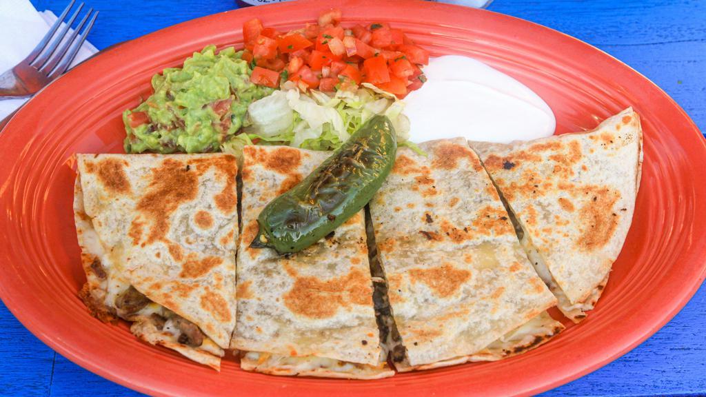 Choice of Meat Quesadilla · choose one:
steak
grilled chicken
shredded chicken
grilled vegetables
carnitas
al pastor
ground beef
chorizo