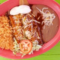 Tamale & Enchilada · Served with sour cream.