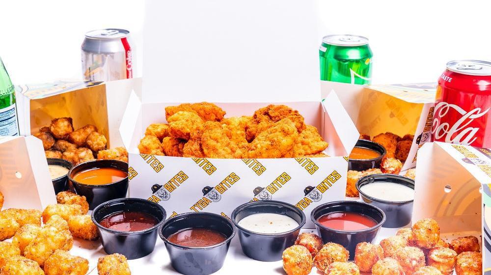 Fam Pack · 32 pieces of oven baked crispy chicken bites seasoned with your choice of dust & served with your choice of 8 dips, 4 orders of tater tots & 4 soft drinks.