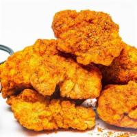 8 Bites · 8 pieces of oven baked crispy chicken bites seasoned with your choice of dust and served wit...