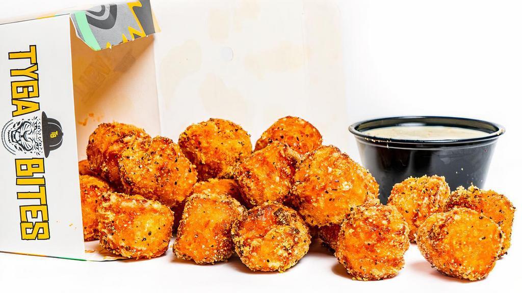Sweet Potato Tyga Tots · A full sized order of bite sized pieces of fried sweet potato seasoned with your choice of dust & dip