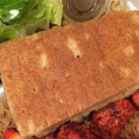 Mourgh Kabab · Chicken served with rice and salad.