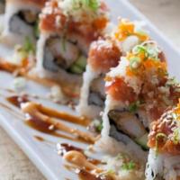 Red Dragon Roll · Shrimp Tempura, Imitation Crab, Cucumber inside and Topped with Spicy Tuna and Tobiko