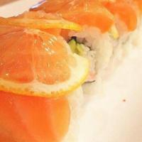 49er's Roll · Imitation Crab Meat, Avocado and Cucumber inside, Topped with Salmon and Lemon Slides