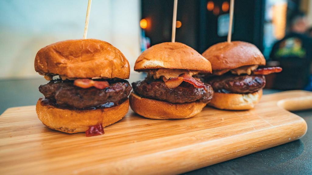 PB & J Slider · Grilled beef patty, topped with bacon, peanut butter and strawberry jelly.