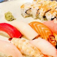 Dinner for Two · Sashimi, sushi, chicken teriyaki, gyoza and tempura, CA roll (6 pcs), seaweed salad.