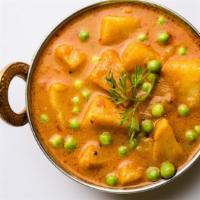 The Aloo Bodi Tama · Freshly prepared mixture of Nepali style potato bamboo, mixed in a black eye bean curry.