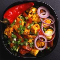 The Chilli Paneer · Freshly prepared dish made by tossing fried paneer in sweet sour and spicy chilli sauce.
