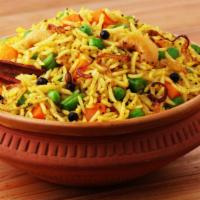 Veg Biryani · Freshly prepared aromatic rice dish made with basmati rice, spices & mixed veggies.