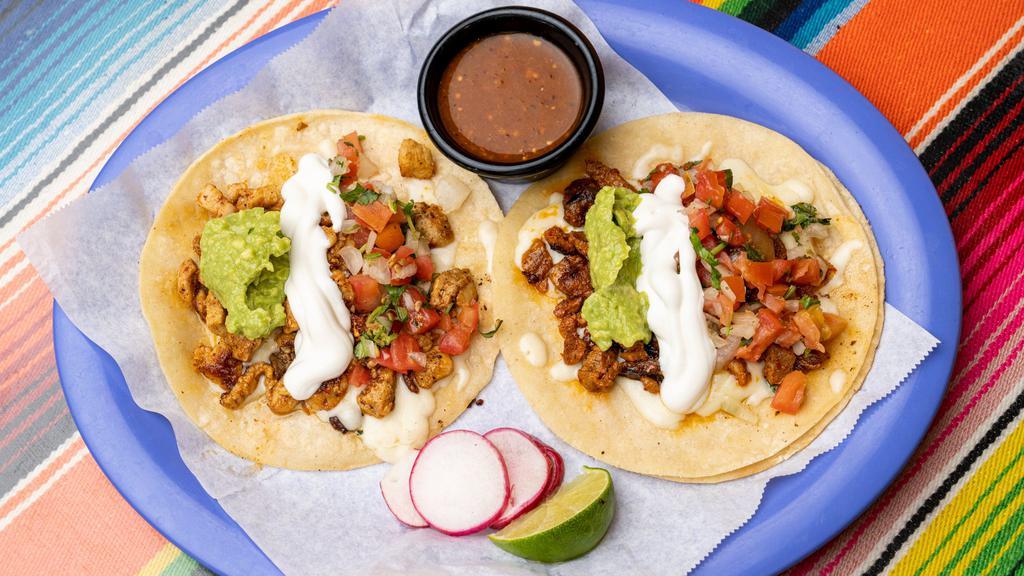 Super Taco · Your chose of meat: chicken, steak or pastor.
This comes with:
Cheese, pico de gallo, gaucamole and sour cream