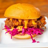 Cluck’s Original · Signature house brined and breaded fried chicken breast, chipotle aioli*, pickled red cabbag...
