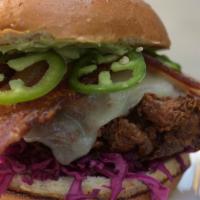 Cluck's Deluxe · Signature house brined and breaded fried chicken breast, chipotle aioli*, pickled red cabbag...