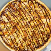 BBQ Chicken Pizza · BBQ sauce, chicken, red onion and cilantro baked on a hand-tossed dough.