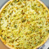 Green Pizza · Pesto sauce, artichoke hearts, spinach, green olives and Parmesan cheese baked on a hand-tos...