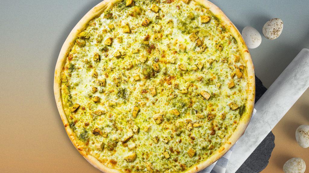Green Pizza · Pesto sauce, artichoke hearts, spinach, green olives and Parmesan cheese baked on a hand-tossed dough.