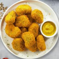 Chicken Nuggets · Bite sized nuggets of chicken breaded and fried until golden brown. Served with your choice ...