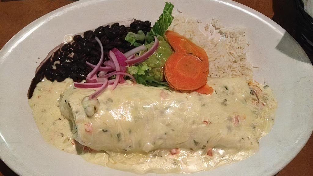 Seafood Burrito · Choice of meat, rice, refried beans, sour cream, mild salsa, onions, cilantro, guacamole, cheese. Choice of shrimp or fish.