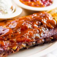 Full Slab of Baby Back Pork Ribs · Served with two medium sides.