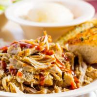 Pulled Pork Meal · Served with two sides and garlic bread.