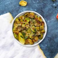 Muscle Brussel · Side of roasted brussel sprouts