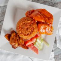 Jollof Rice · A special blend of fried rice with mixed vegetables, chicken breast or drum stick, red and b...