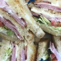 Club House · Triple decker sandwich with bacon, lettuce, tomato and Black Forest Ham on one side, turkey ...