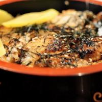 UNAGI DON · - Eel over rice with homemade unagi sauce, Japanese yellow radish, shredded dry seaweed, and...