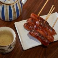 KUROBUTA SAUSAGE (6 pcs.) · - Grilled Japanese pork sausages served with spicy mustard.