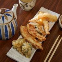 MIX TEMPURA · - 5 pcs. assorted veggies and 2 pcs. shrimp with tempura sauce.