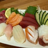 SUPER DELUXE SUSHI COMBO · Chef's choice 8 pieces nigiri and 9 pieces of sashimi (tuna, hamachi, salmon)