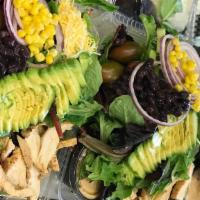 47. Southwest Salad · Romaine & mixed greens w/ avocado, corn, black beans, shredded cheese, cucumber, tomatoes, r...