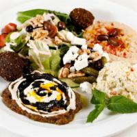 Middle Eastern Platter · With kashko bademjan, hummus, falafel, tomatoes, feta  cheese and imported olives. Served wi...