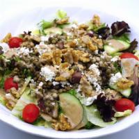 Mediterranean Salad · Fresh greens with lentils, walnuts, feta cheese and olives, served with a light vinaigrette ...