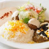 Vegetarian Combination Plate · A combination of humos, kashk-o bademjan and falafel served with saffron rice and salad. Ser...
