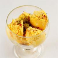 Bastani · Rose water flavored Persian ice cream with pistachios.