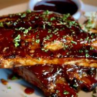 BBQ Glazed Ribs · Tender pork spare ribs smothered in our GH stout BBQ sauce.