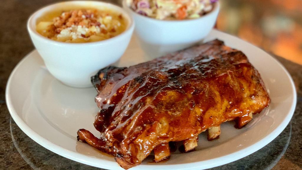 Grill House Ribs · GH Stout BBQ Sauce, potato salad, GH Mac N' Cheese (topped with bacon)