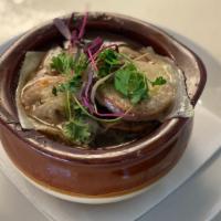 French Onion Soup  · served with sliced toasted french baguette and swiss cheese
