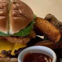 Grass Fed Beef Burger · cheddar cheese, heirloom tomatoes, lettuce, crispy onion rings, chef's special spread, baked...