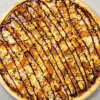 BBQ Chicken Pizza · Barbecue sauce, juicy grilled chicken, mozzarella, chopped garlic, fresh basil, and extra vi...