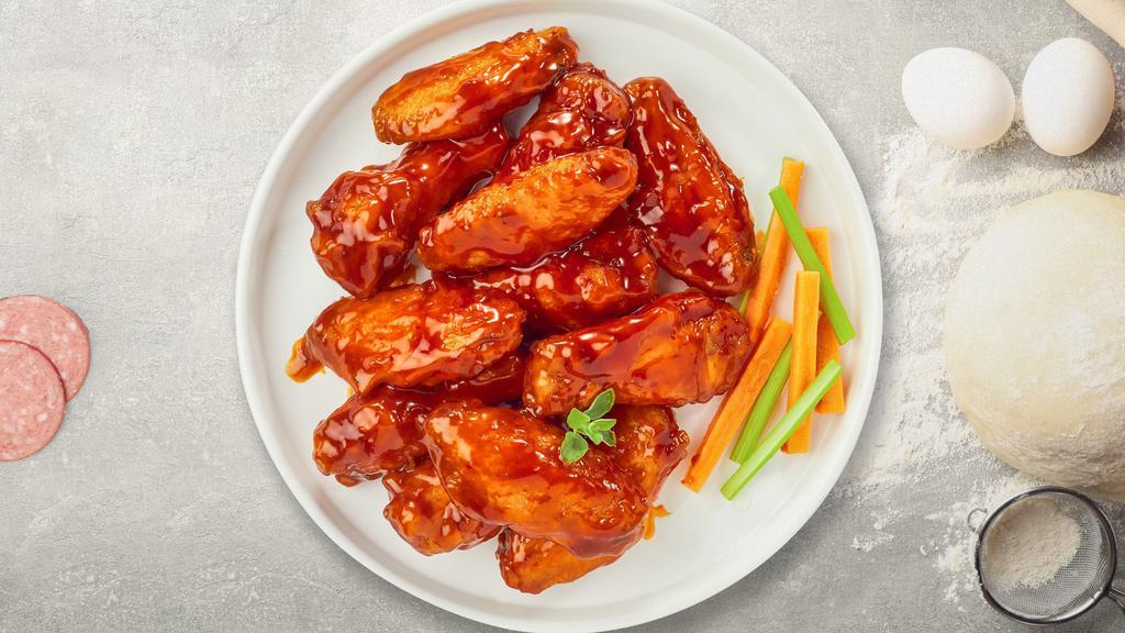 Buffalo Wings · Fresh chicken wings breaded, fried until golden brown, and tossed in buffalo sauce.