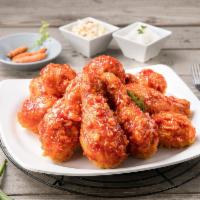 Crispy Yang-Nyum Chicken · Crispy fried chicken tossed with Korean sweet chili sauce. Choice of Mild or Spicy.