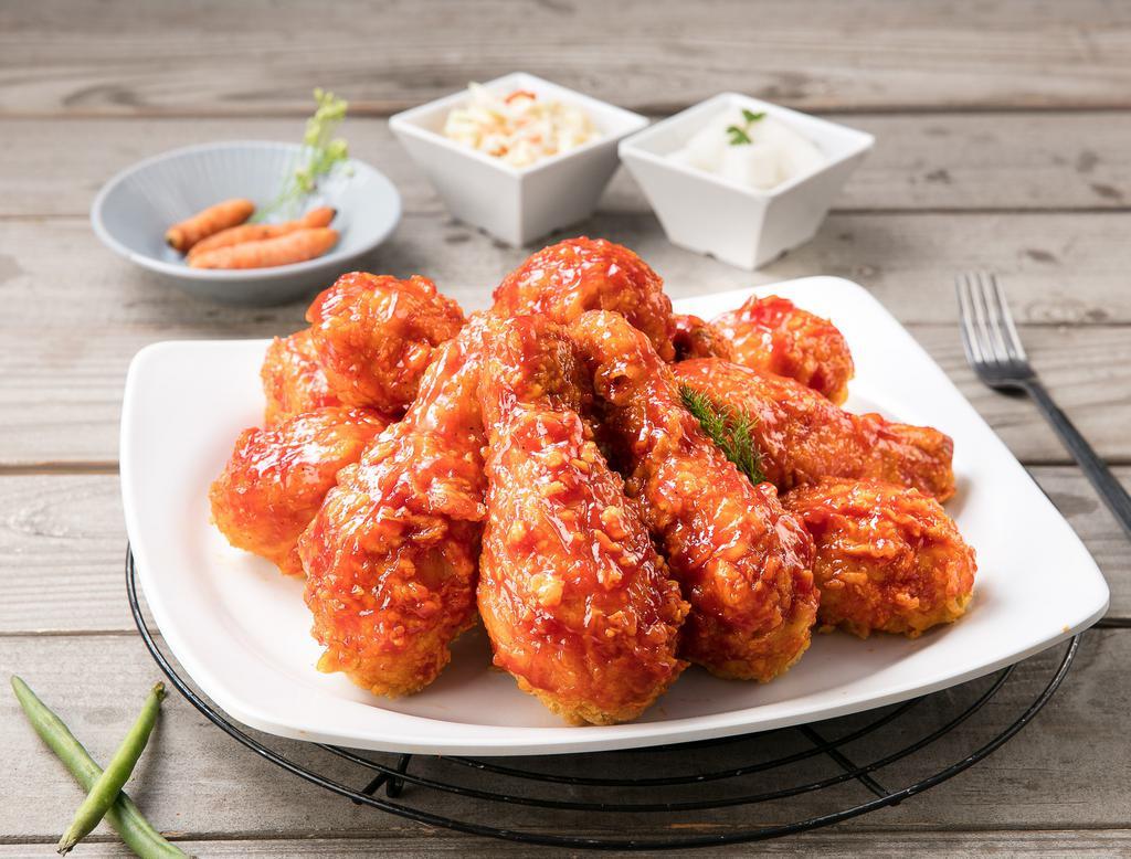 Crispy Yang-Nyum Chicken · Crispy fried chicken tossed with Korean sweet chili sauce. Choice of Mild or Spicy.