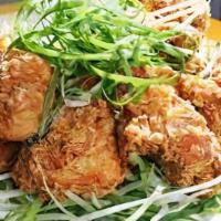 Crispy Padak Chicken · Crispy fried chicken drizzled with sweet wasabi sauce and topped with shredded green onions.