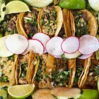 24 Taco Tray · TWO OF OUR 12 TACO TRAYS. Our delicious street tacos with the meat of your choice, onions an...