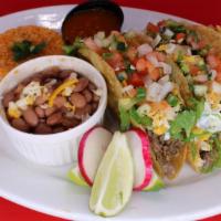 Three (3) Super Crispy Tacos Plate with Rice & Beans · Our Crispy tacos are made with your choice of meat topped with shredded lettuce, cheese, sou...